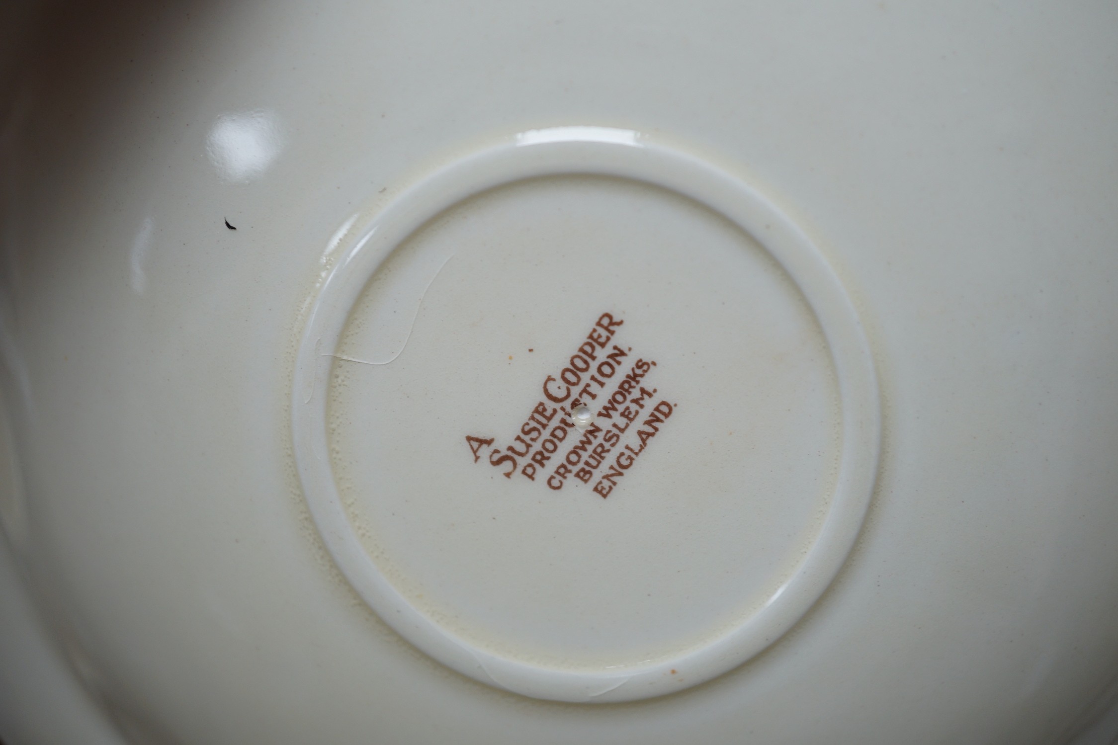 A Susie Cooper large bowl, a hors d'oeuvre set and a tea-for-two set